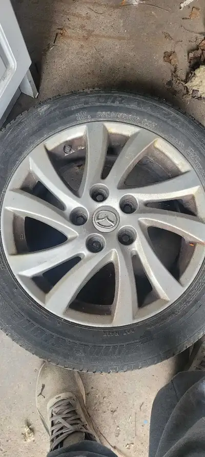 4 Mazda rims and tires for sale 300 285/75 R17FOUR all terrain BF goodrich baja champions mounted on...