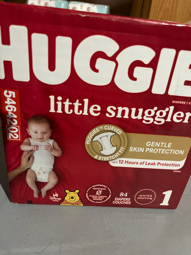 Baby Huggies size one diaper box  in Bathing & Changing in Ottawa - Image 2