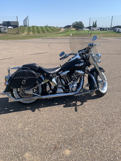 Well maintained, lady driven, new rear tire, lots of after market chrome. 53,800 km. Contact Dennis...