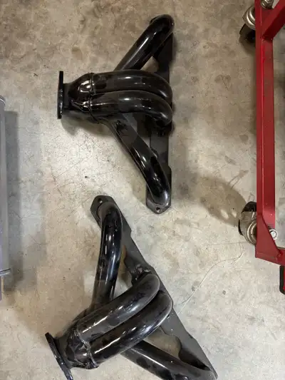 New and unused short style tube headers for small block Chevy $60