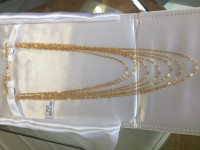 14k solid gold woman’s 7 strand necklace 14.4 grams