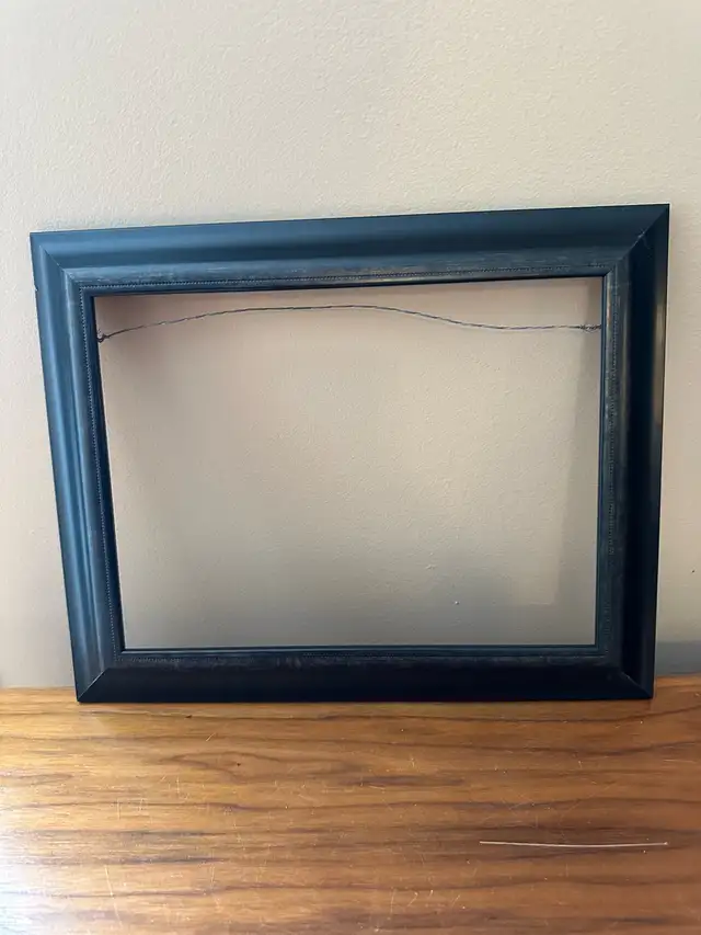 Black Wood Picture Frame (no glass)- opening is 8 1/2 x 11 1/2“