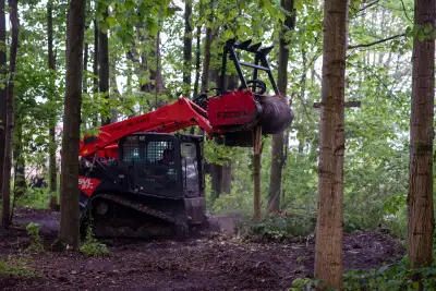 Kubota skidsteer with mulcher rental. Mulch up to 8 inch trees. Great for trails, building lots, fen...