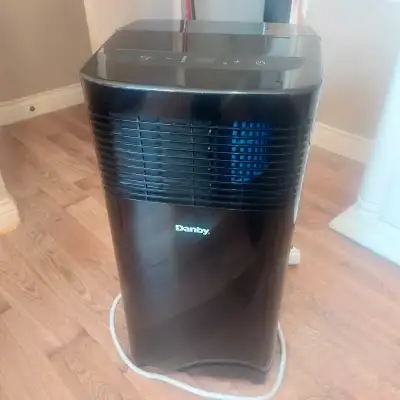 ANYONE  OUT THERE WANTS TO TRADE 5000 BTU AIR COND FOR RIDE ON, View more