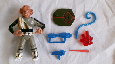 This is a vintage, fully poseable, Ferengi action figure from the Star Trek the Next Generation TV s...