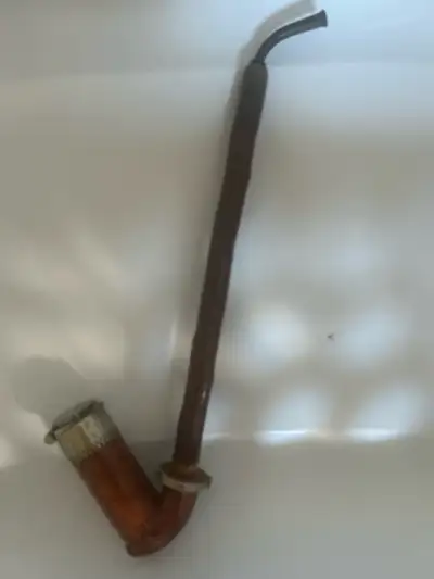 Mid-nineteenth century Anton Partsch smoking pipe. Cherry wood and embossed clay . Nickel end . Made...