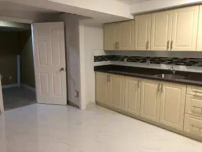 The available room is one of three rooms in a three-bedroom basement apartment which has attached fu...