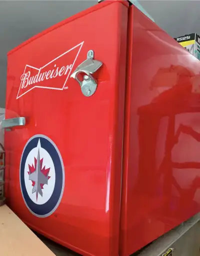 Brand new Winnipeg Jets mini fridge never used works great., View more