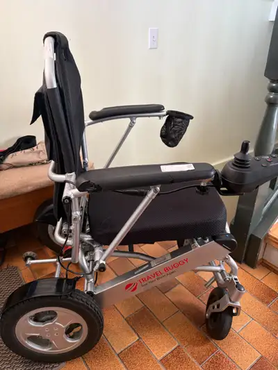 Wheelchair with Extendable Travel Ramps Our latest update features a stronger power system, updated...