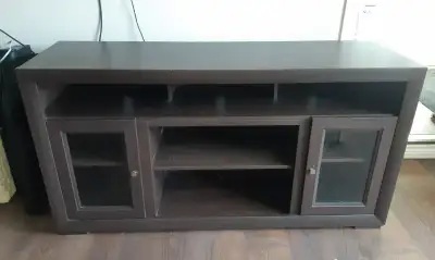 This is a solid piece you will need help to move it (no stairs) shelves are adjustable It measures a...