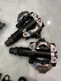 Shimano SPD pedals + 2 sets of SPD cleats