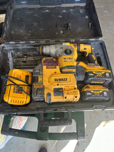 Dewalt Hammer drill. 2-6ah batteries and a quick charger. Lightly used. About 3 years old. Perfect c...