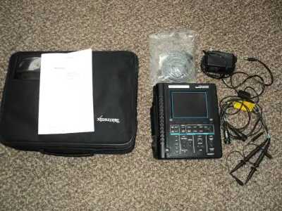 Tektronix THS720A Tekscope 100MHz Scope/DMM Digital RealTime Oscilloscope Two Channel Charging Cable...