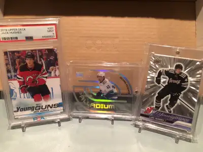 I'm offering a selection of hockey cards featuring young stars, including a 2019 Upper Deck Jack Hug...