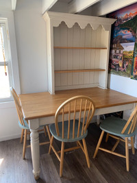 Wood table, 3 chairs & hutch 