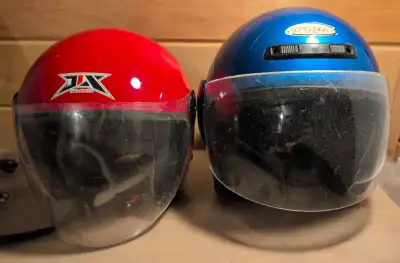 1 red, size small (55-56cm). 1 blue, size large (61-62cm). $40 each, $60 for both. Je parle français...