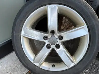 $250 - four OME Rims that are in great condition w/Winter Tires 55R17 (tread on 2-tires are good sti...