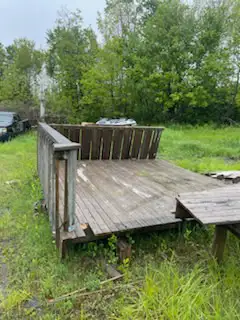 12’ x 13’ Deck with railing and also end privacy wall. There is also another pie shape section $600...