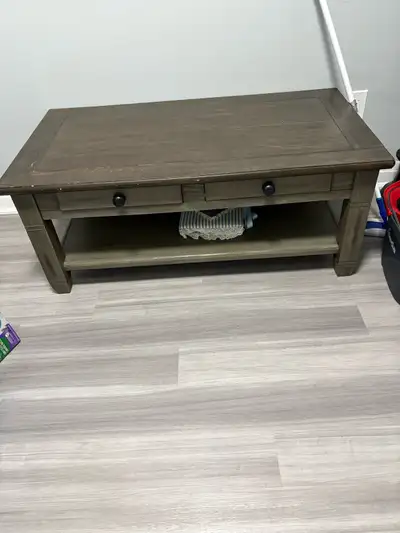 6 month old solid wood, distressed coffee table. Have original bill of sale. Paid $1095 asking $400