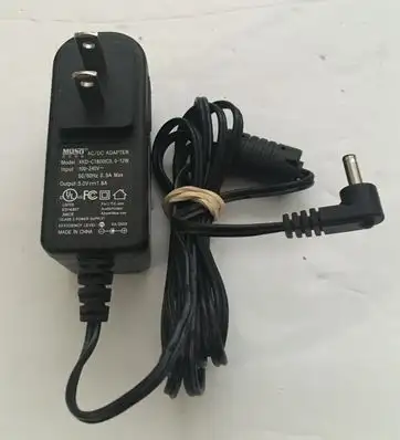 This is a MOSO AC/DC Adapter, model XKD-C1800IC5.0-12W Power Supply Cord. Input: 100-240V, 50-60Hz,...