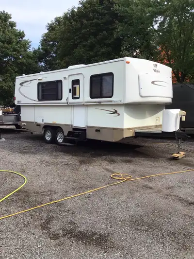 2006 Hi Lo camper trailer (lowers to half height when traveling), 24 ft; used as bunkie, sleeps 5; k...
