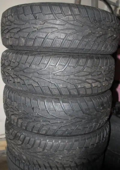 Set of 4 Uniroyal Tiger Paw Ice & Snow 3 tires 215/70R16 in excellent condition.