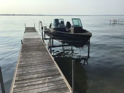 Lund fishing boat minimally used as leisure boat comes with boat lift. Some damage to upholstery but...