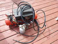 3 Gal. Air Compressor with Spray Can.