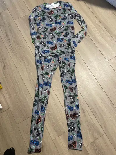 Size 12/13 kids pjs- stretchy and can fit smaller. Good shape. Pick up off Fox Creek Rd Dieppe