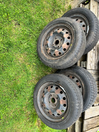 Set of 4 15” all season tires with rims