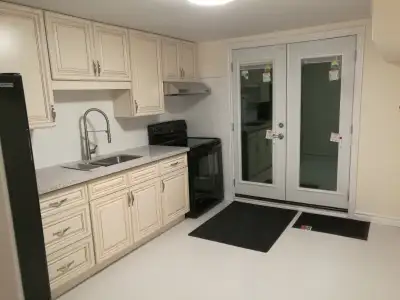 A furnished 1‑bedroom walkout basement apartment in a detached house is available for rent near Squa...