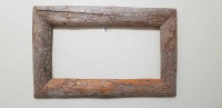 Unique worm wood pine picture frame for a 7" x 13" picture.