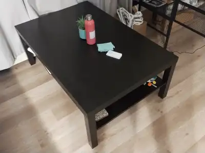 Large coffee table with storage space underneath. Approximately 46 x 31 inches