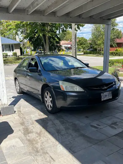 I am selling my 2004 Honda Accord, a reliable sedan with 350000 km on it. This car has been my trust...