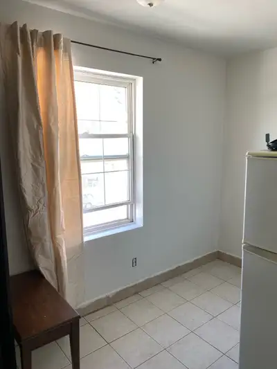 Very small studio room in the top of the old building with no elevator , near Center Street 16 Ave N...
