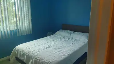 This is a room for rent within a house, as seen in the pictures. The room is furnished with a full b...