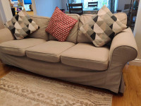 Ikea Sofa and love seat with throw pillows and extra covers