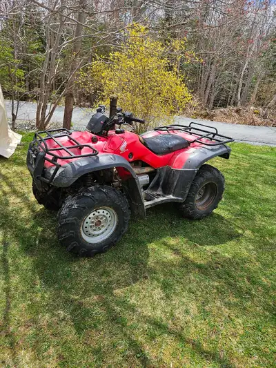 I am offering to trade a 2006 Honda TRX350FE 4x4, a reliable and rugged ATV ready for any terrain. T...