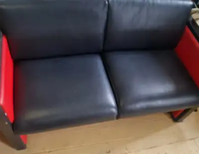 Black and red leather couch, View more