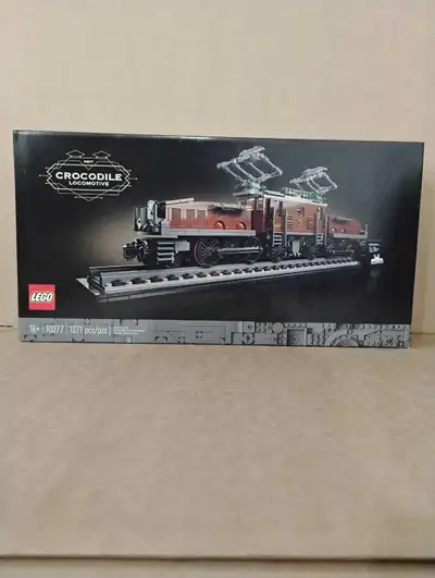 I'm selling a brand new, in box, LEGO 10277 Crocodile Locomotive set, a detailed model with 1271 pie...