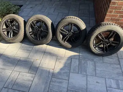 Toyo Observe GSI-5 225/60 R17 winter tire mounted on 17-inch black rims. In excellent condition with...