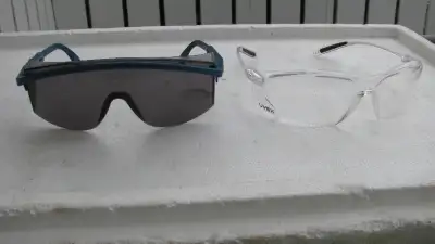 2 Pairs of safety glasses; one clear UVEX and one sunglasses in good condition. $5.00 for both; also...