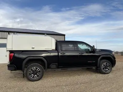 Attention Tradesmen. 2022 GMC Duramax crew cab short box with Spacekap service box. Comes with inter...