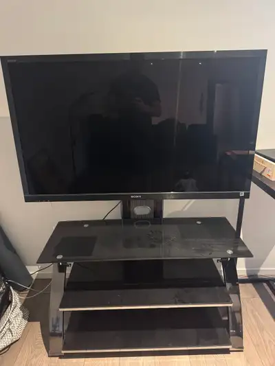 Older Sony LCD TV with stand. The TV is attached to the stand, original stand no longer available.