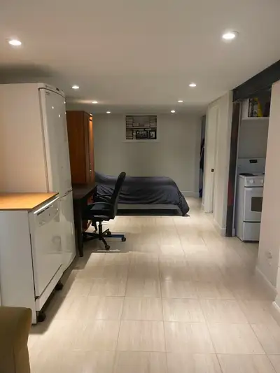 Suits single woman. Renovated basement apartment. Shared laundry. Parking available in back for smal...