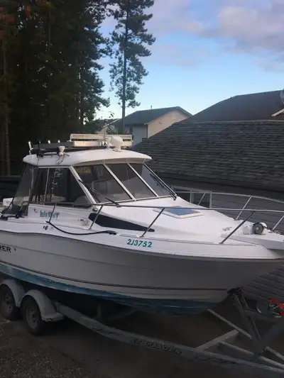 2004 campion explore in great condition. Great big water or ocean boat sleeps 3-4 people full canvas...