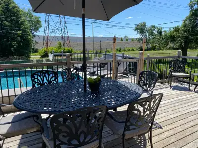 Enhance your outdoor living space with this elegant patio set, featuring a beautifully crafted table...