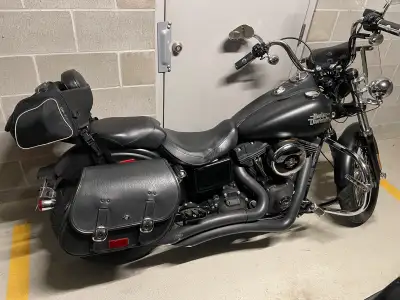 Exceptionally clean Street Bob with numerous upgrades. Six speed, 103 cubic inch, three headlights,...