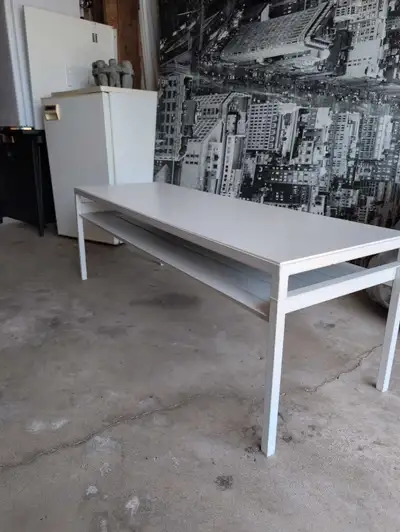 Strong metal coffee table with removable wood top. Metal shelf underneath. Great for kids or small s...