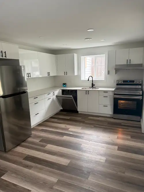Bright 3 bedroom unit with private entrance, large open kitchen living room with in unit laundry - w...